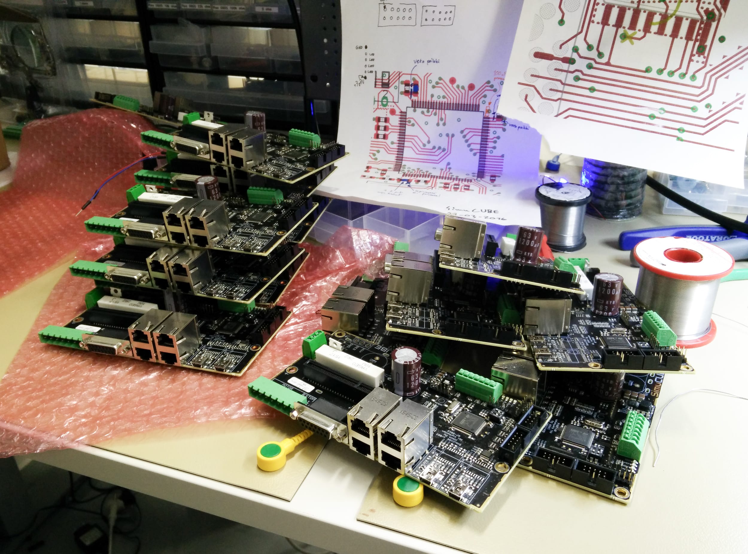 Simucube 1 prototypes laying on the table