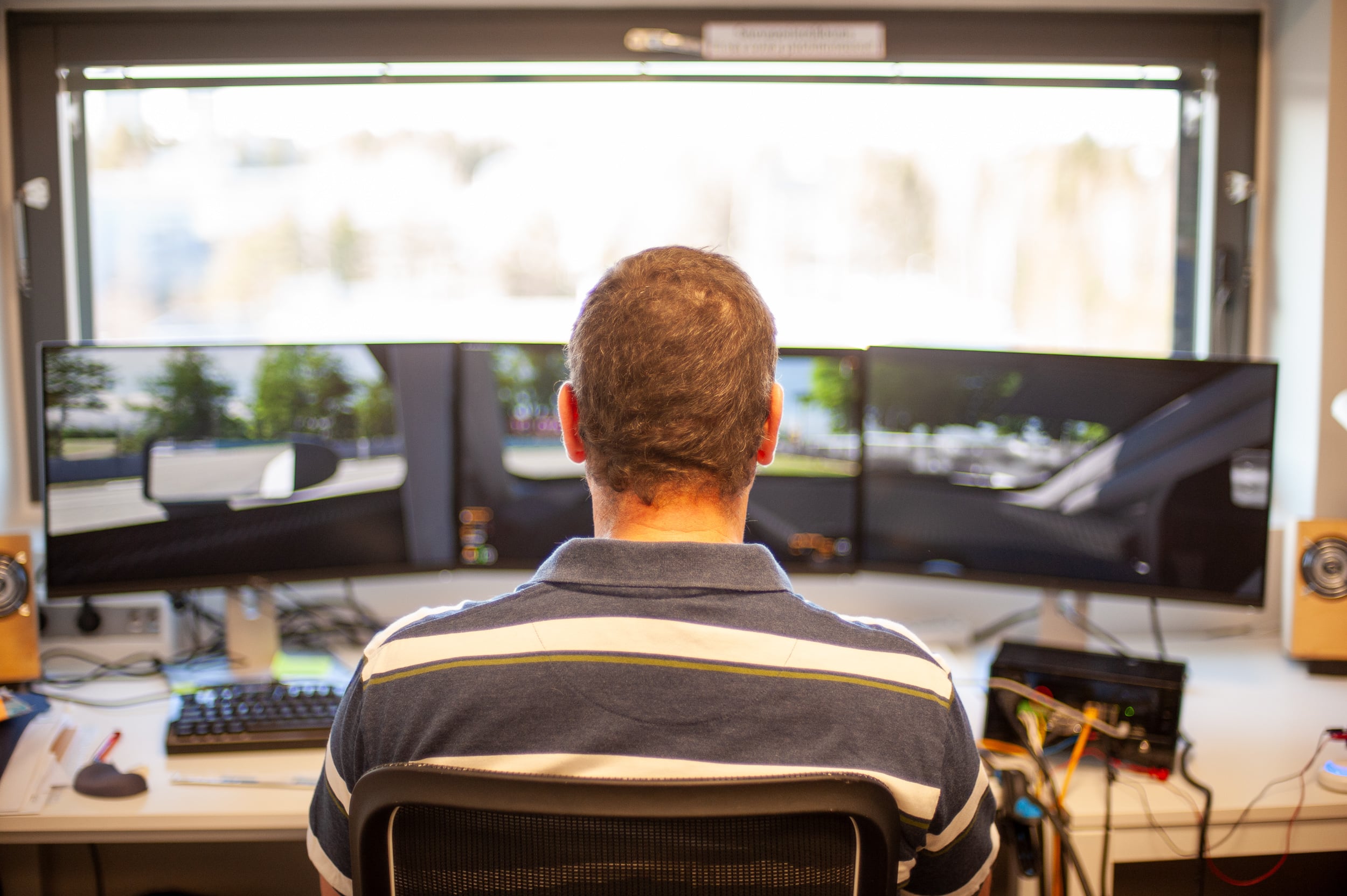 Phillip "Beano" sim racing community member at Simucube office