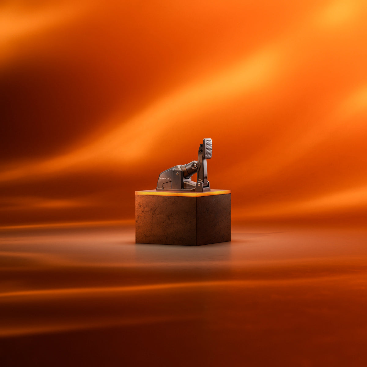 ActivePedal Sport on a plinth against an orange backdrop