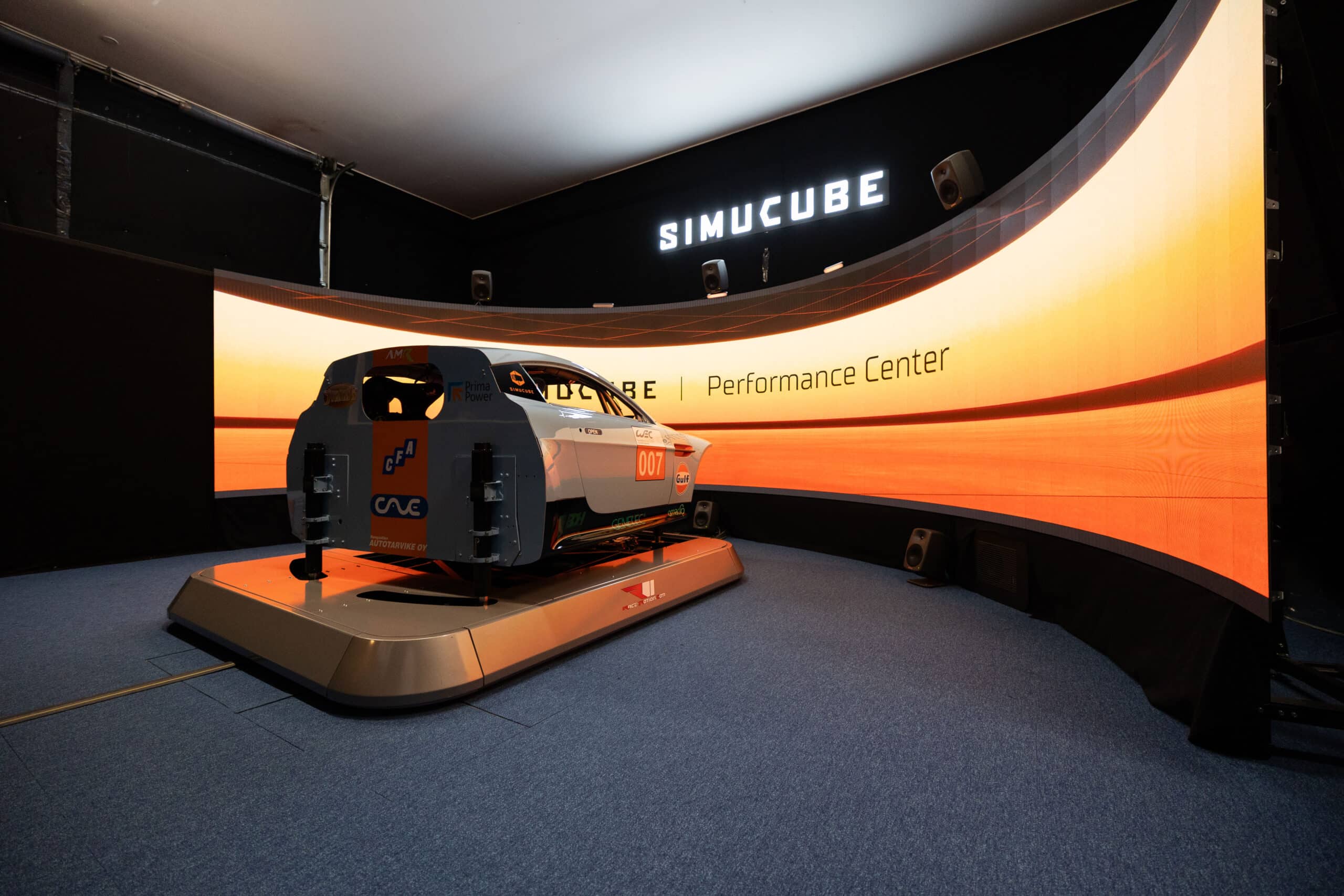 Drivers training on full-size Simucube rigs at the Performance Center